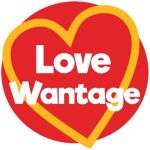 The words love wantage in white font on top of a red circle background with a yellow heart outline.